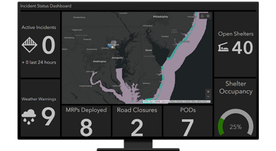 A desktop computer showing an incident status dashboard that shows the area affected in purple, the number of open shelters, weather warnings, active incidents, road closures, and more 
