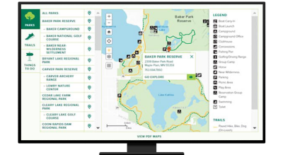 A desktop computer showing a website where users can select parks, trails, and things to do, and a map view with information about the parks in the selected area