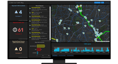 A computer displaying a live traffic map with sidebars showing accidents, traffic jams, and road closures 