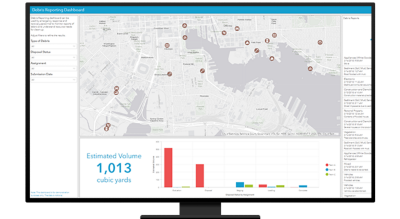 A computer displaying dashboard and map for debris reporting 