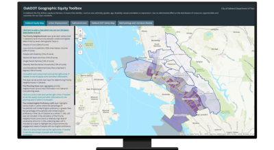 Graphic of a computer monitor displaying a map dashboard with data and a map in purple and beige