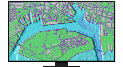 A monitor displaying a green map with purple outlines